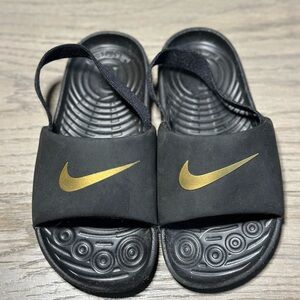 Nike toddler Black and Gold Slide Sandals size 10
